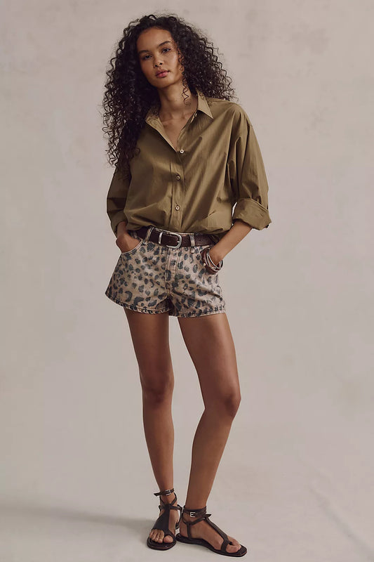 Leopard print denim shorts with button fly and belt loops