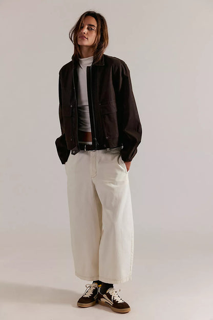 Laydown chino pants in clean ivory, wide-leg fit with belt loops and front button