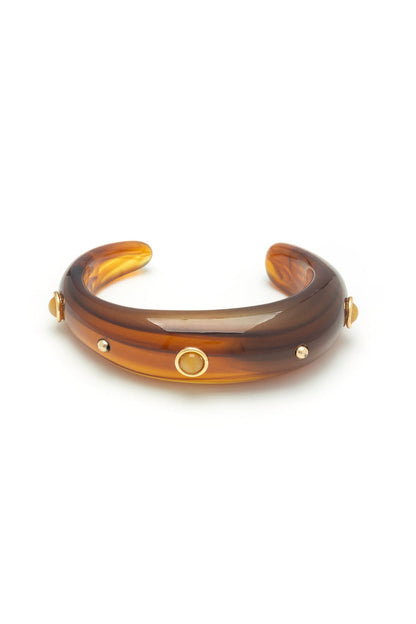 Amber resin bangle with gold ring center and small gold studs