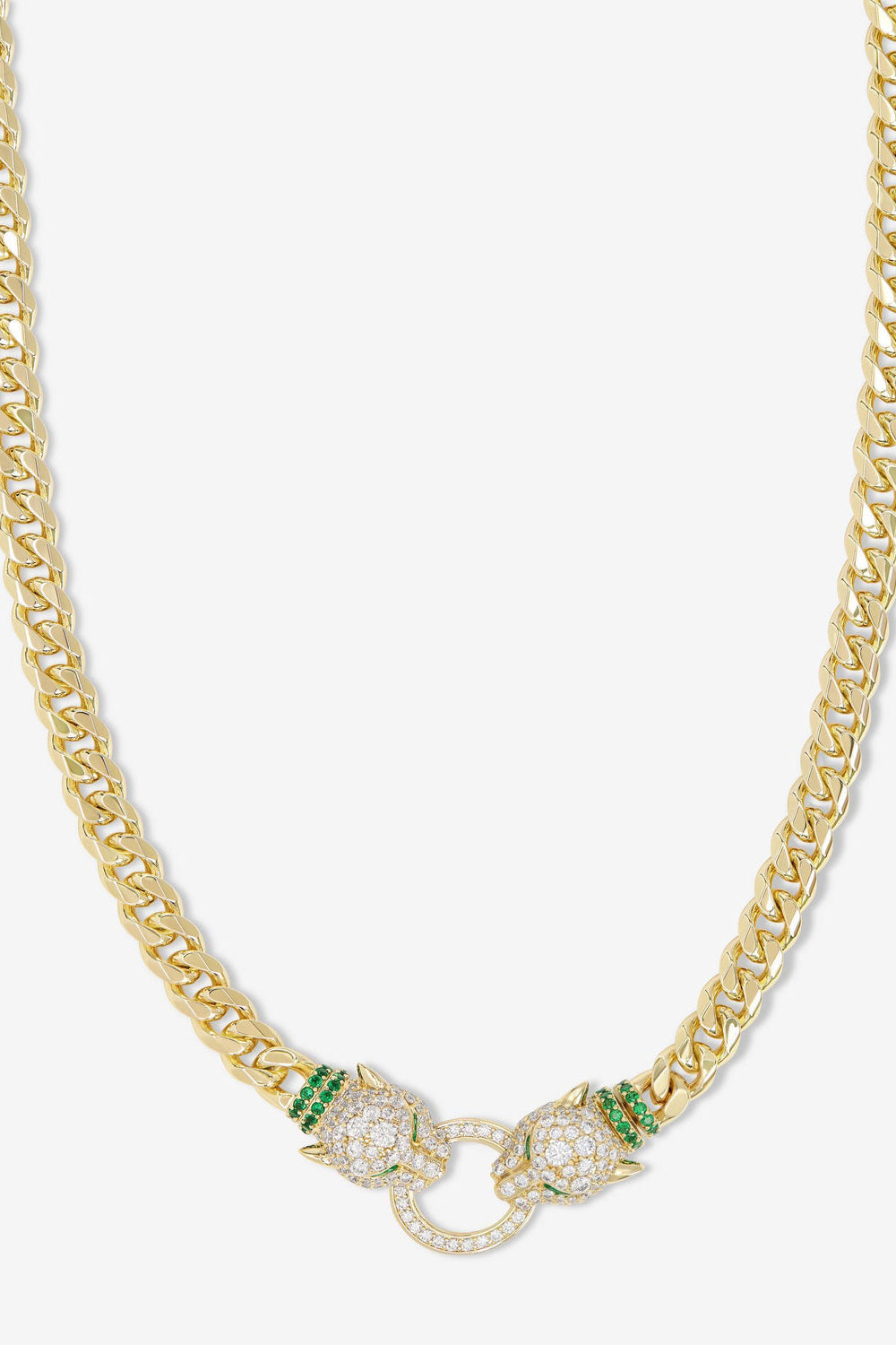 Gold Cuban link necklace with oval crystal stations and green accent stones