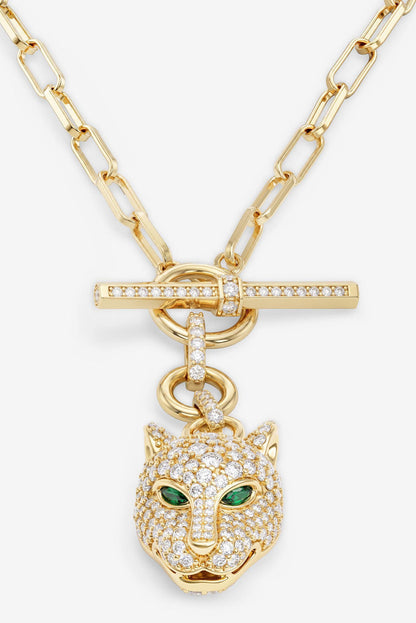 Gold tone chain necklace with crossbar ring clasp and sparkling jaguar head charm