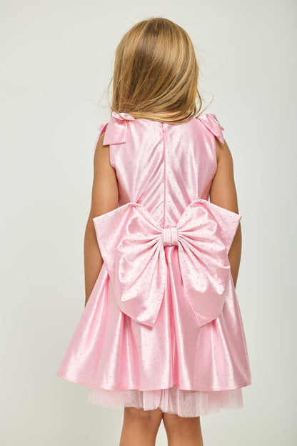 Pink sleeveless back dress with large waist bow and layered skirt hem
