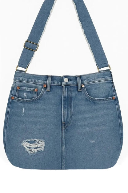 Blue denim bag with a strap on a white background