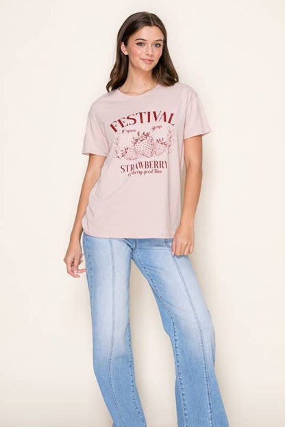 Light pink crew-neck tee with large centered strawberry festival graphic