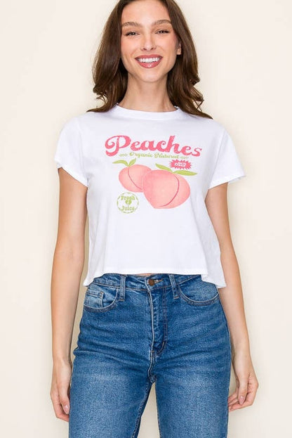 White crop T-shirt with centered peaches logo graphic, short sleeves