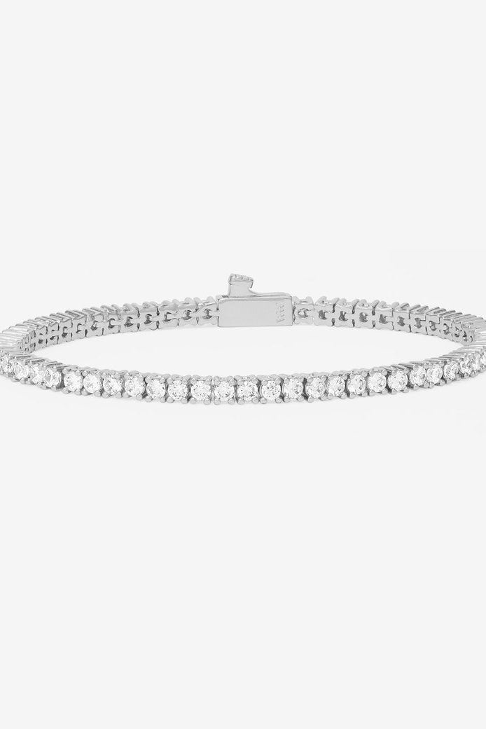 Silver-tone tennis bracelet with row of white pavé stones
