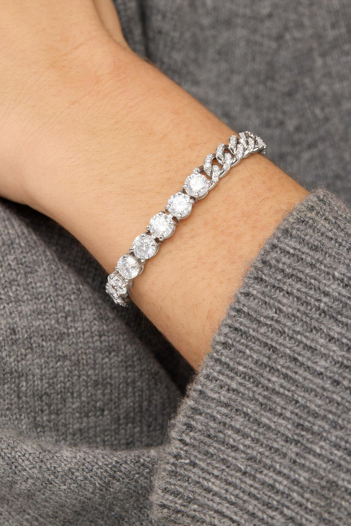 Silver-tone pavé tennis bracelet with diamond-look stones on wrist