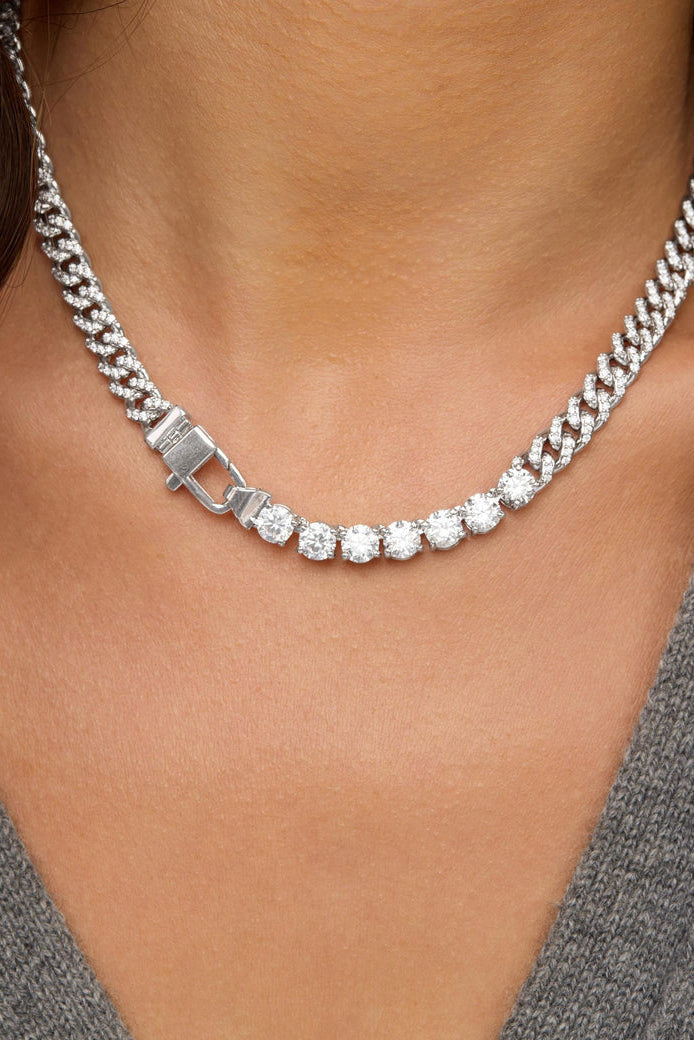 Silver-tone tennis necklace with white stones and square link clasp at neckline