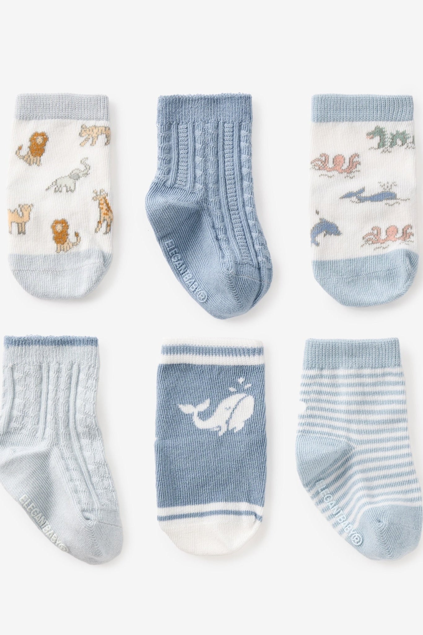 Six baby socks in light blue and white, featuring animals, stripes, and ribbed cuffs