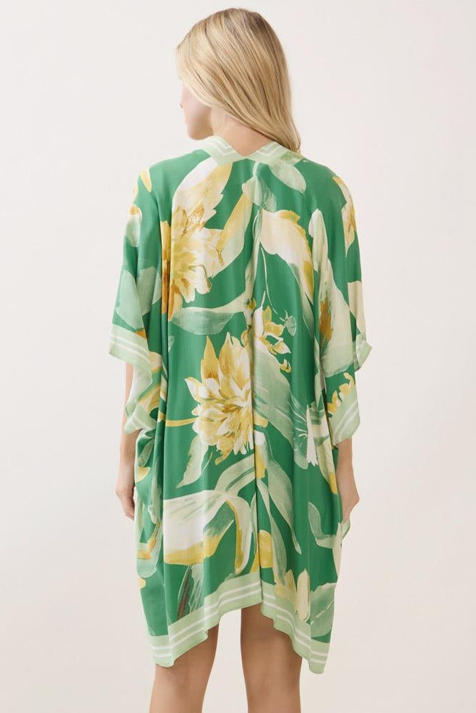 Green floral print kimono with cape back and yellow blossom motifs