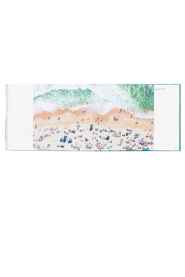 Coastal wall art print with turquoise surf over sandy shoreline, small beach details