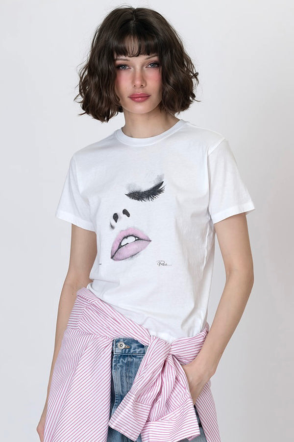White front graphic T-shirt with eyelashes and pink lips