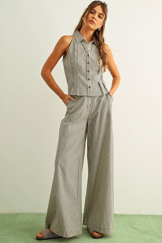 Vertical striped wide-leg trousers with high waist and front button closure