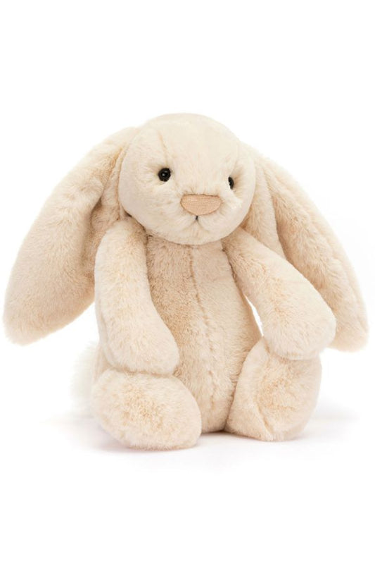 Cream plush bunny sitting with long ears and stitched face