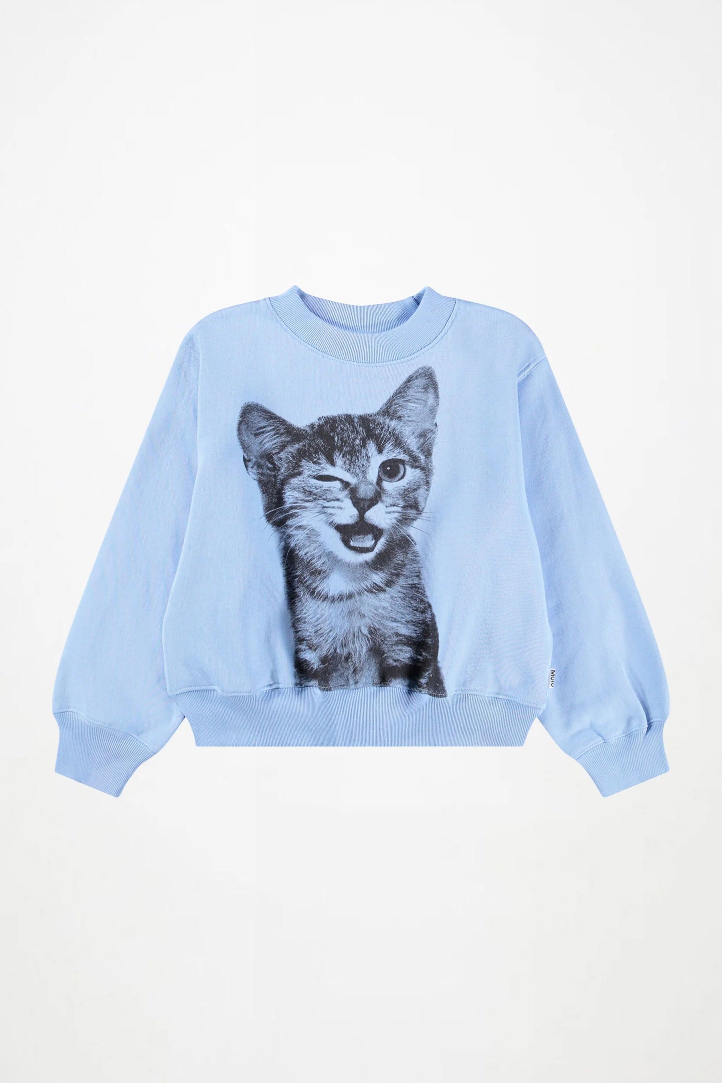 A light blue crewneck sweatshirt featuring a large graphic print of a winking tabby kitten on the front, displayed against a clean white background.
