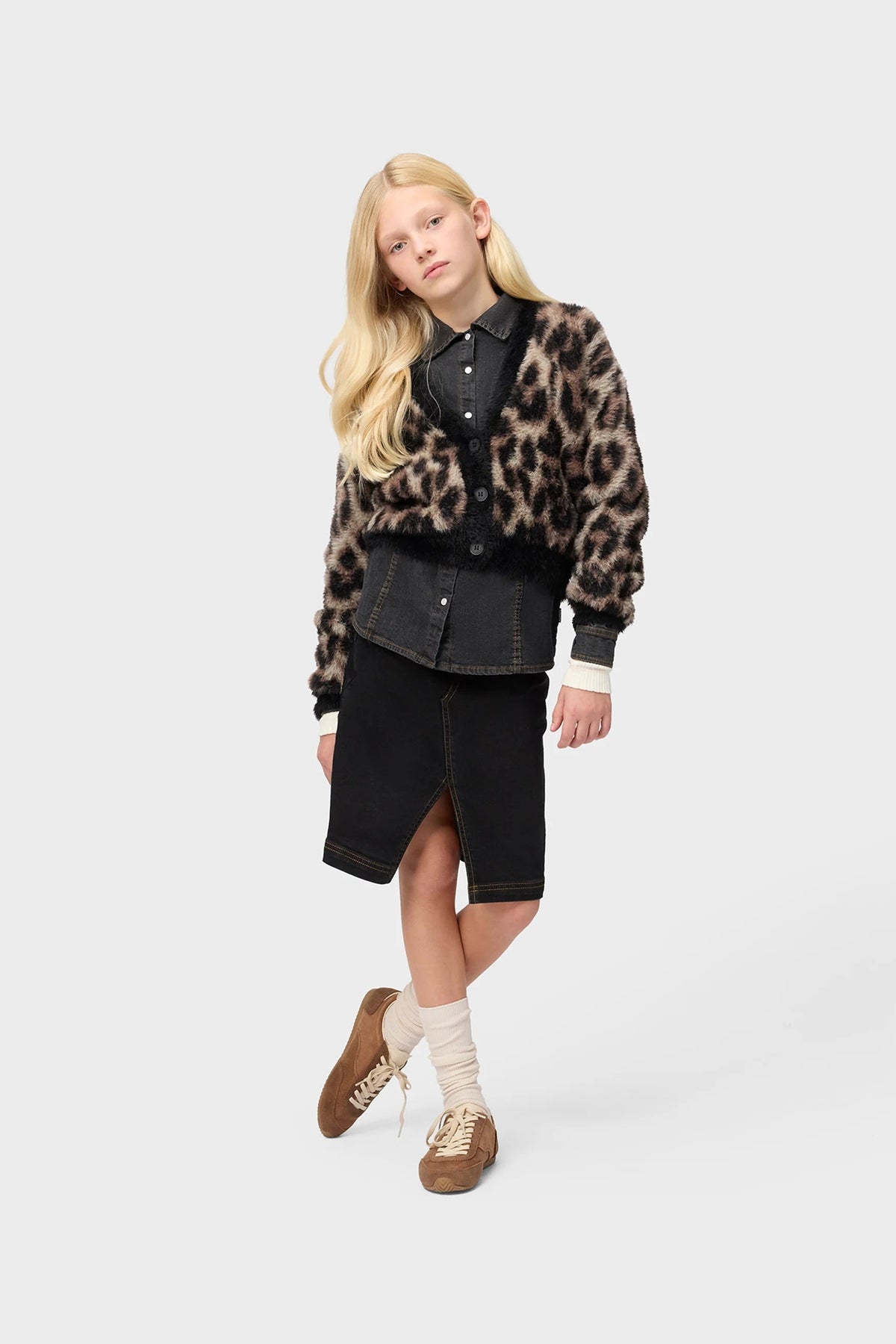 Leopard-print button-front cardigan with ribbed cuffs and hem, worn on model