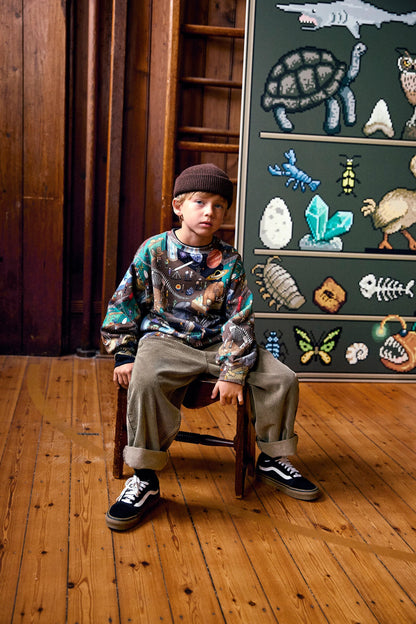 Washed bark Aster pants worn by child, relaxed wide-leg fit with elastic waist