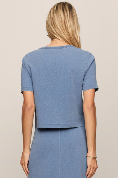 Back view of woman wearing the santorini indigo stellan jersey denim tee 