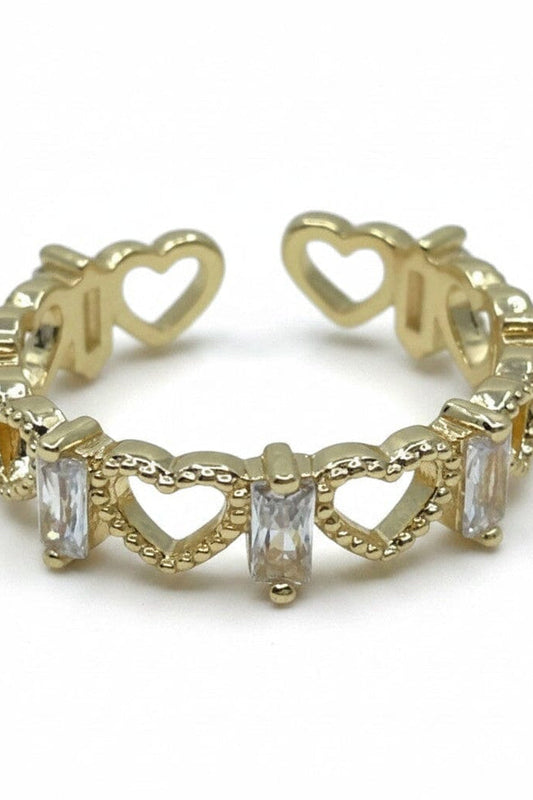 Gold-tone heart baguette-cut ring with openwork hearts and clear stones