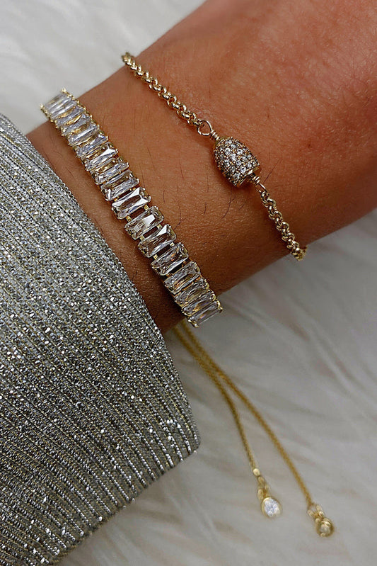 Gold CZ baguette pull chain bracelet with pavé oval center charm