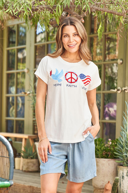 White cap-sleeve jersey tee with peace graphic and heart accents