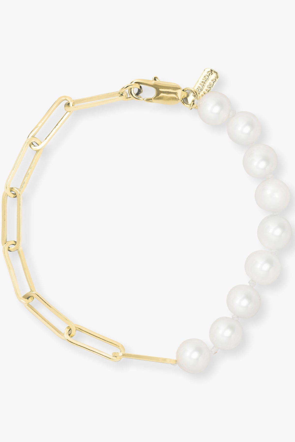 Samantha Pearl bracelet with gold chain on a white background