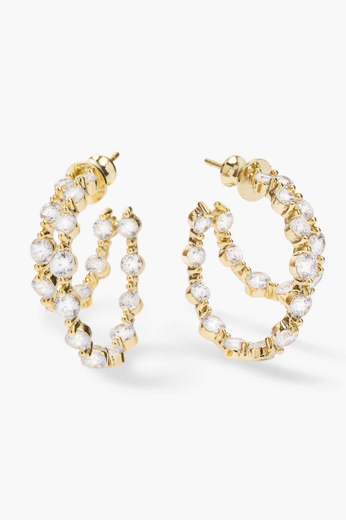 Gold double hoop earrings adorned with clear faceted rhinestones &pearls , displayed on a clean white background.