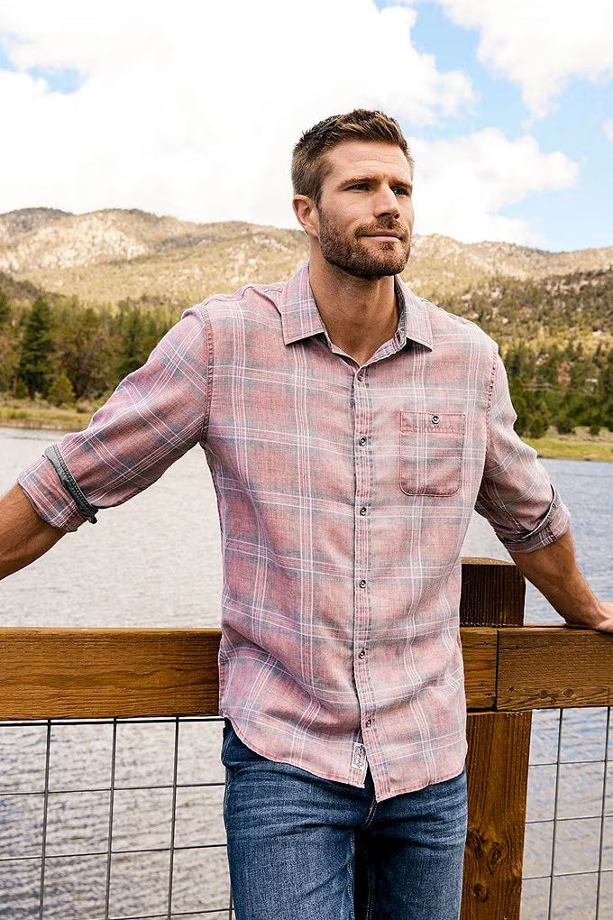Man wearing the Paxton Longsleeve Vintage Soft Collared Shirt in Red & Black against a lake and mountain background
