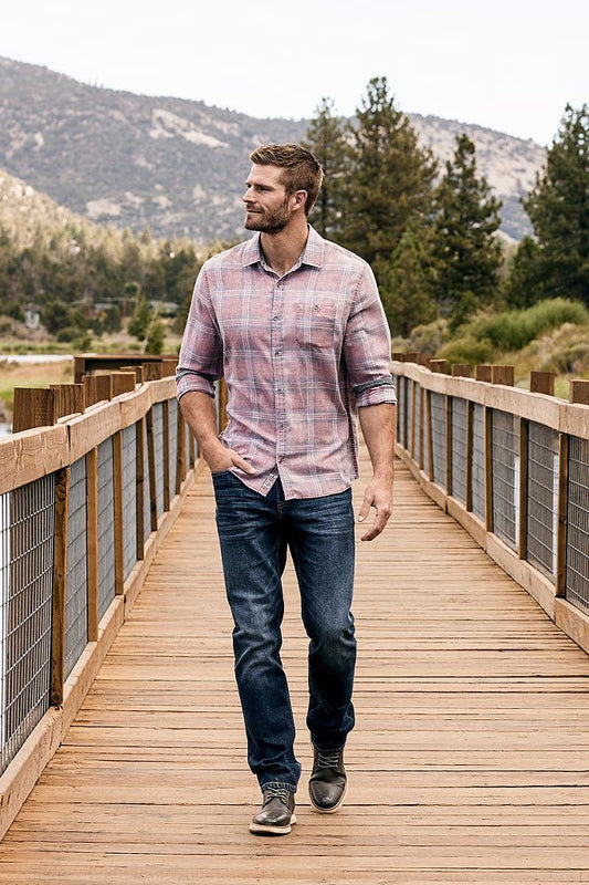 Long-sleeve vintage soft shirt in pink plaid, button front, worn with jeans.