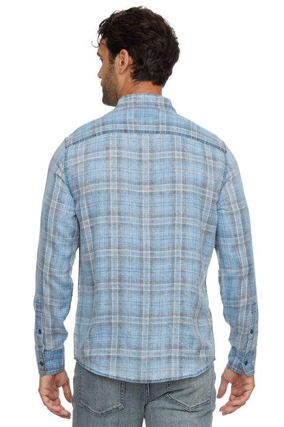 Back view of man wearing blue & navy plaid paxton long sleeve vintage button down shirt 