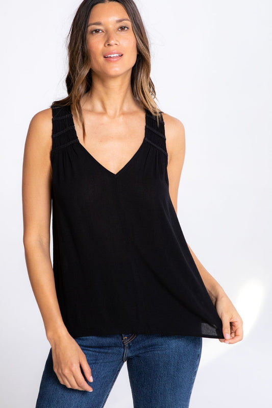 Black double V-neck tank top with ribbed knit straps and flowing relaxed fit