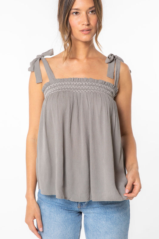 Cement smocked tie-shoulder tank top with square neckline and gathered bodice.
