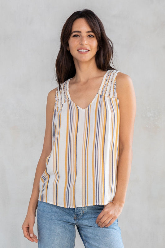 Striped racerback tank top with smocked neckline, blue and gold vertical stripes