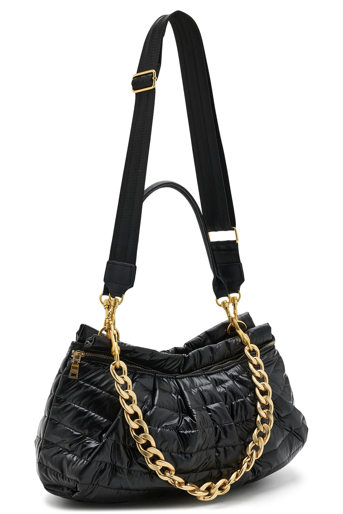 A hold me close clutch black quilted puffer shoulder bag with a gold-tone chain strap and a wide black shoulder strap, shown on a plain white background.