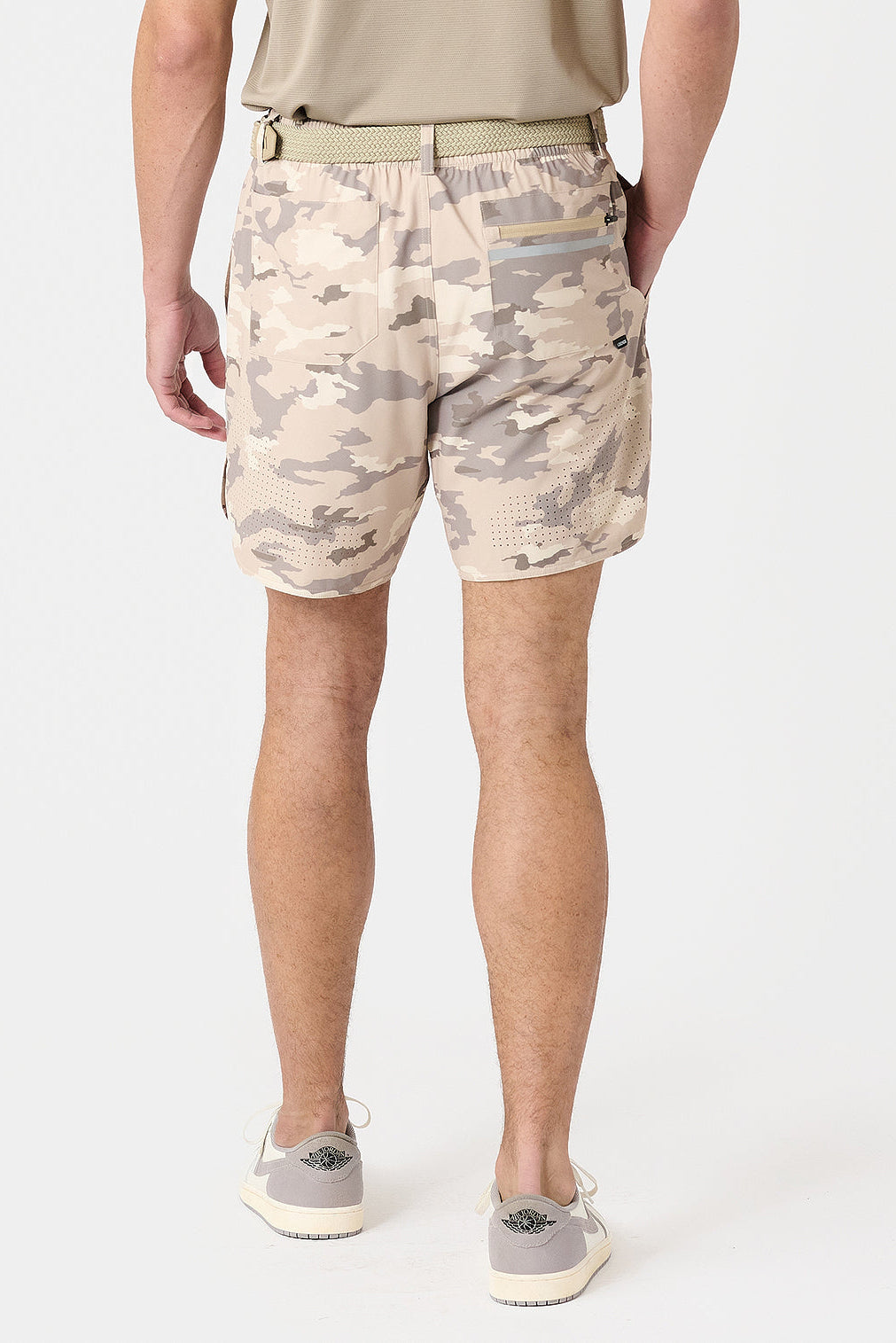 Back view of man wearing Luka Golf shorts in river rock camo 