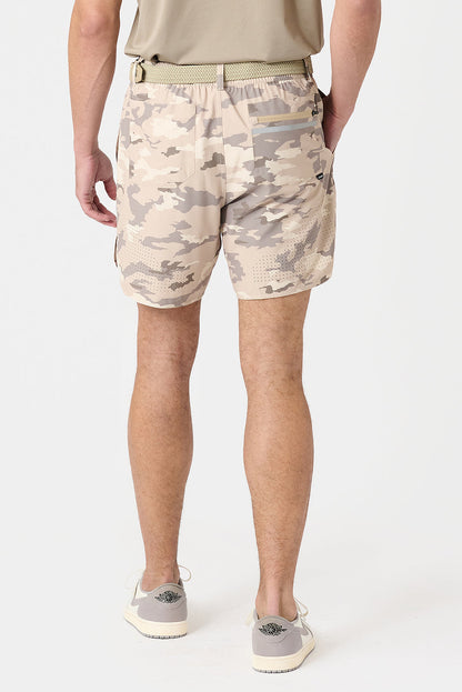 Back view of man wearing Luka Golf shorts in river rock camo 
