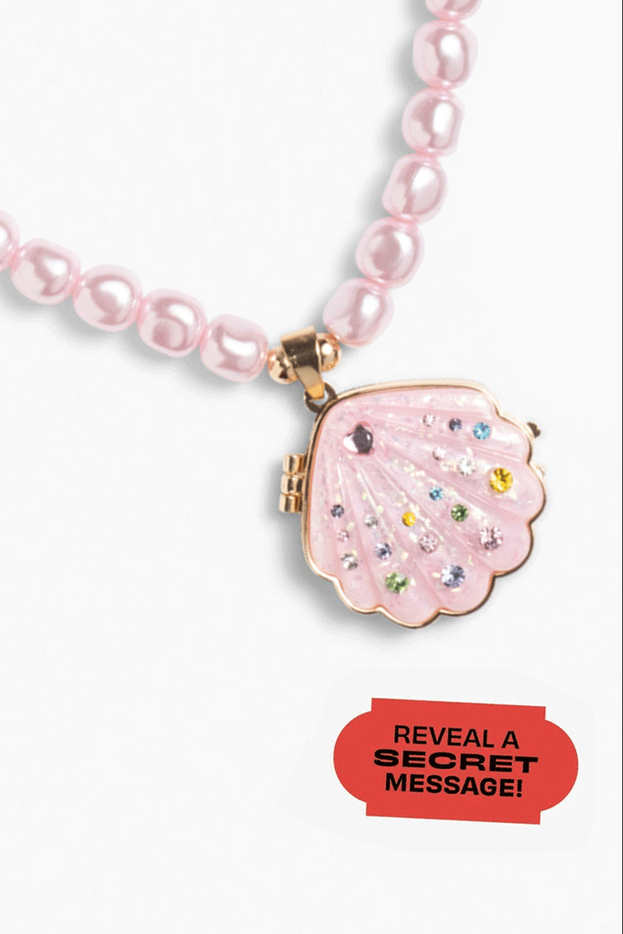 Pink beaded necklace with a clasp that reveals a secret message on a white background