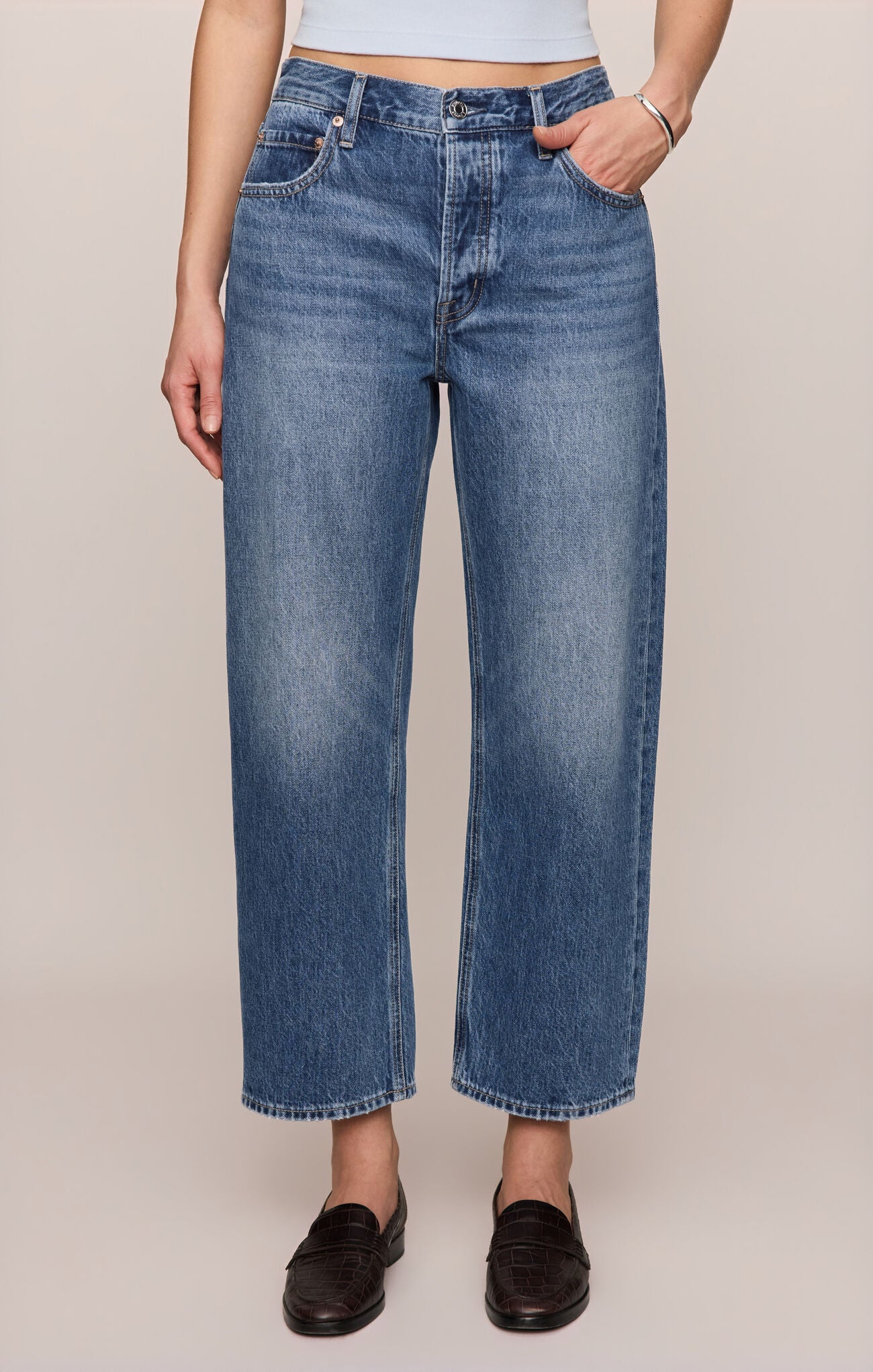 Front view of person wearing Off Duty Bowed Ankle Jeans in Breakpoint color variant