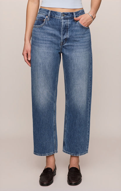 Front view of person wearing Off Duty Bowed Ankle Jeans in Breakpoint color variant