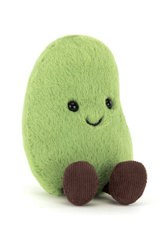 A green plush soyella edamam toy with a smiling embroidered face and brown feet, centered on a plain white background.