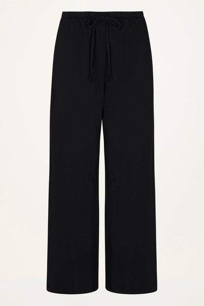 Black wide-leg trousers with an elastic drawstring waistband, shown flat against a light off-white background.