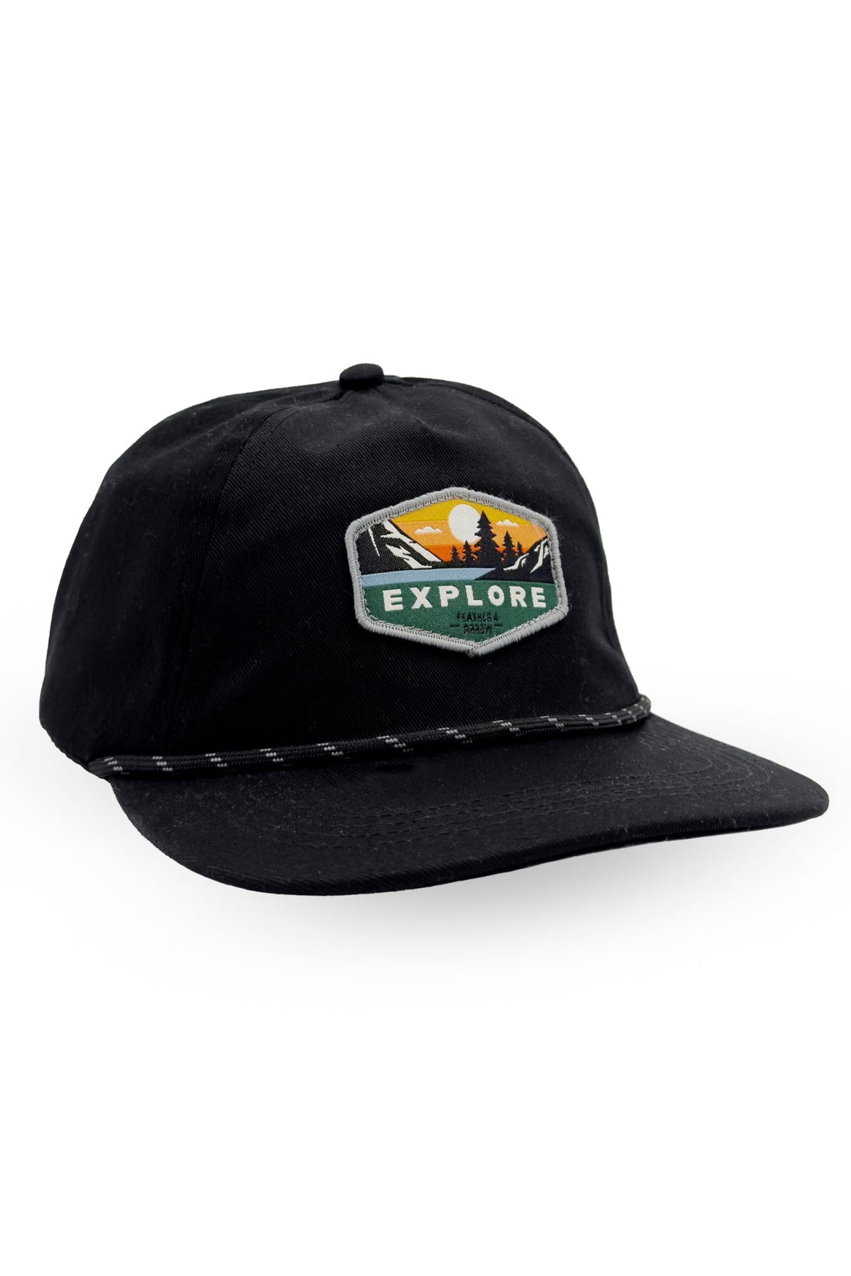 A black flat-brim baseball cap with a decorative stitched rope detail across the front of the brim and a hexagonal embroidered patch on the front that reads 'EXPLORE' with a mountain and sunset graphic, shown on a plain white background.