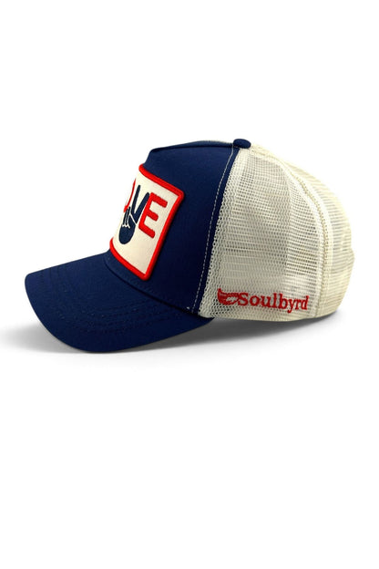 A navy blue and cream trucker hat with a patch on the front and 'Soulbyrd' embroidered on the side, shown against a plain white background.