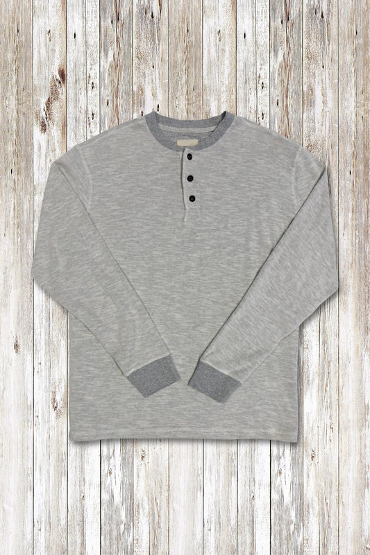 Heather grey long-sleeve rib henley shirt on a wooden surface
