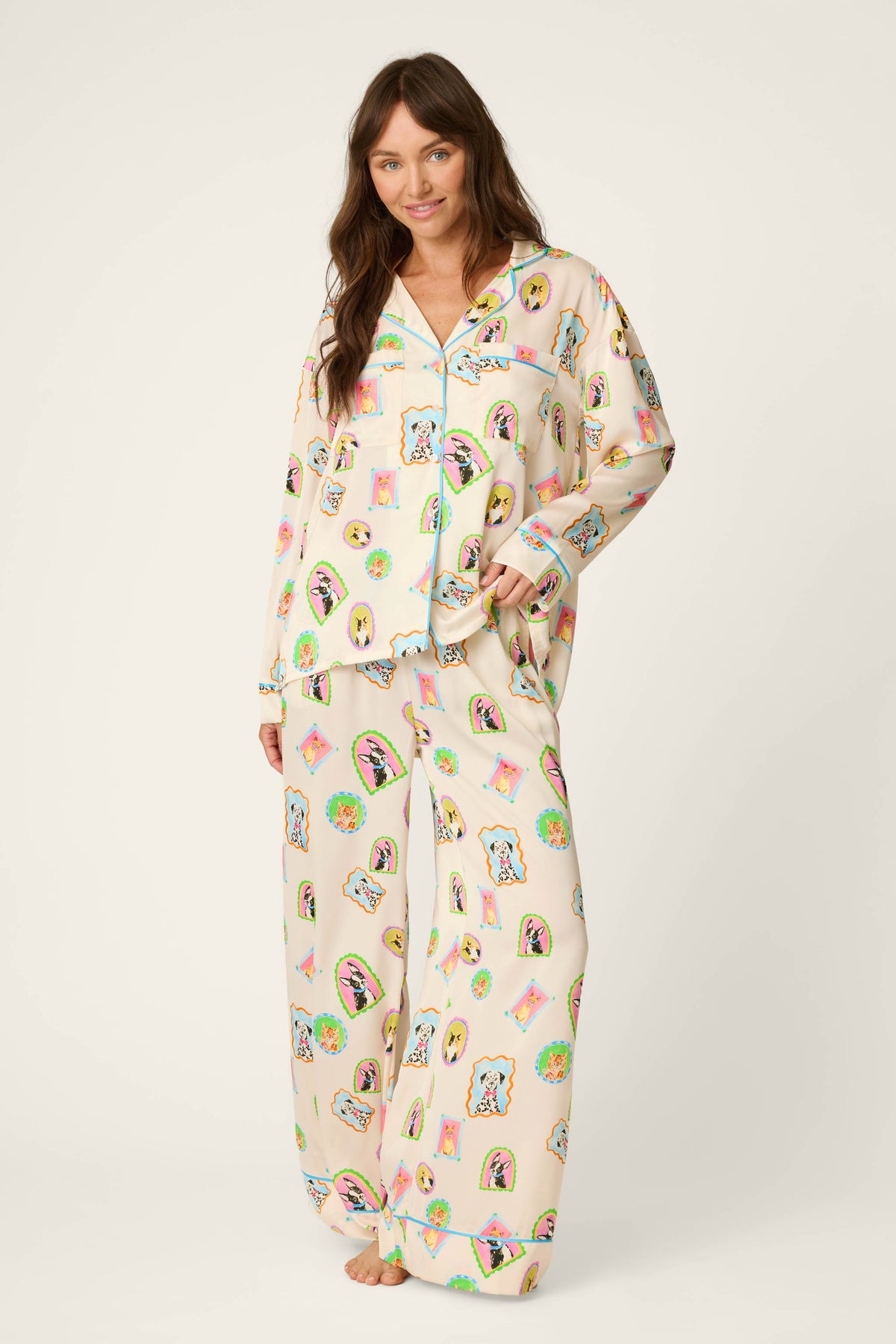 Woman wearing picture purfect satin long sleeve pajama top and matching pajama pants 