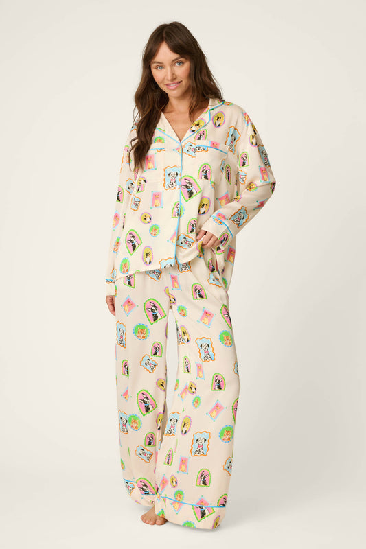 Woman wearing picture purfect satin long sleeve pajama top and matching pajama pants 