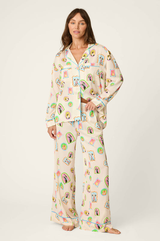 Woman wearing the picture purfect silk pajama pants with matching top 