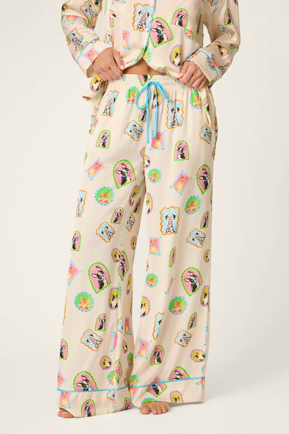 Woman wearing picture purfect silk pajama pants with matching long sleeve top 