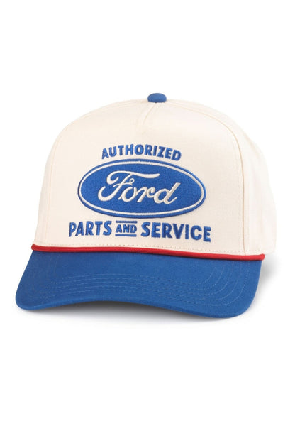 A cream colored hat with blue embroidery 'Authorized Ford Parts & Service" with a blue brim and red lining 