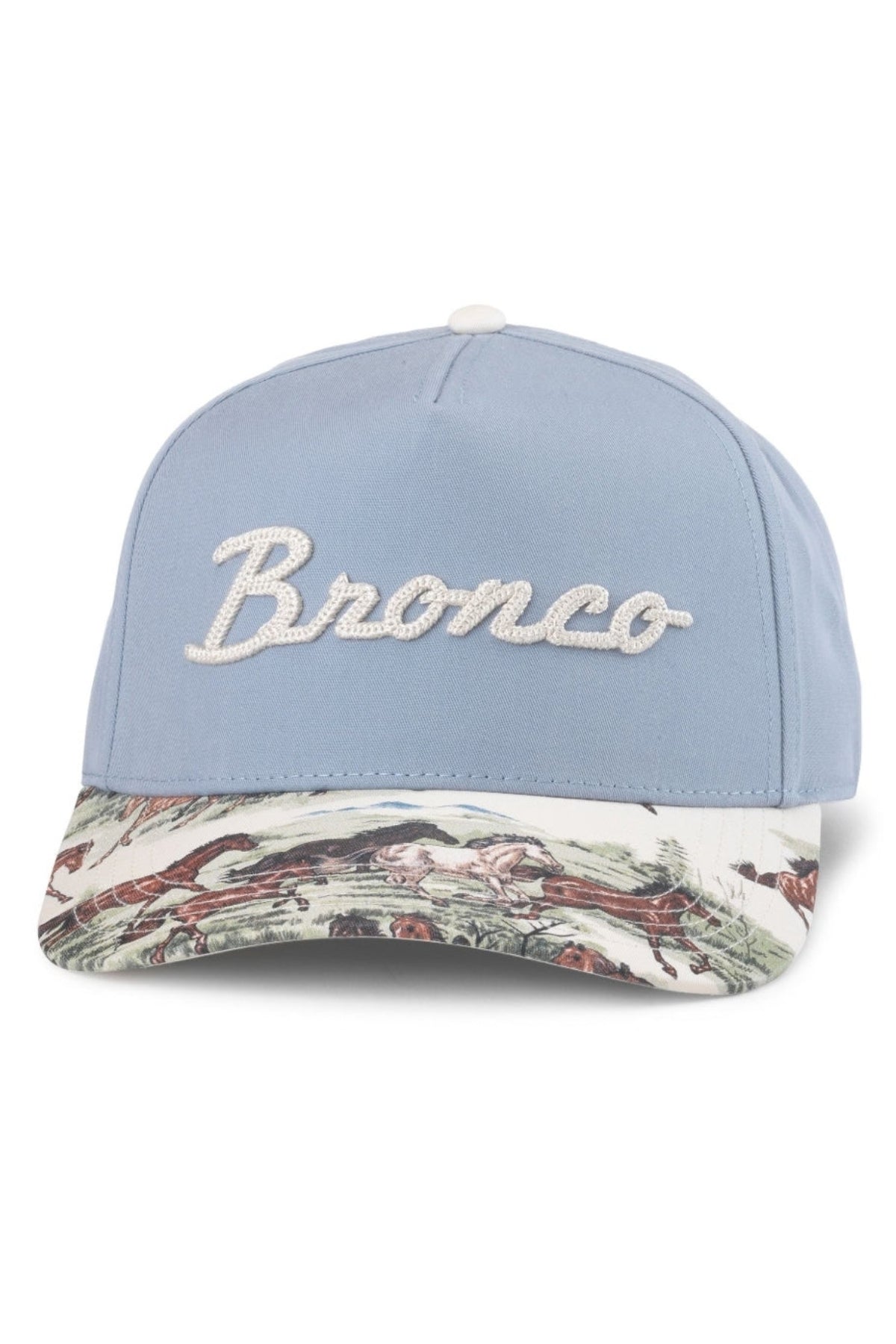 A light blue baseball cap with 'Bronco' embroidered in white script on the front, featuring a multicolor scenic pattern brim.